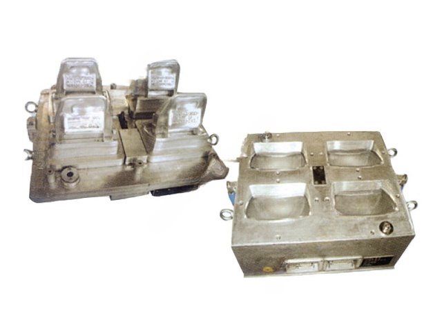 One-mould-four-cavity headrest foaming mould